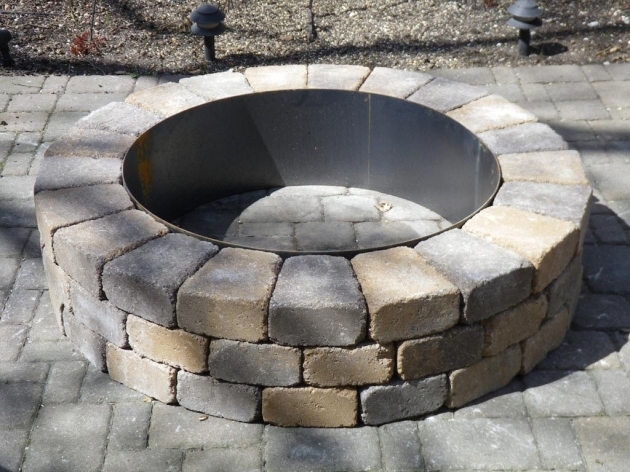 Alluring Immaculate White Stone Fire Pit Ring On Cement Pavers Backyards As Fire Pit Ring Rural King