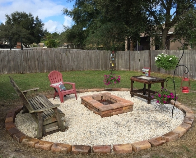 Amazing Fire Pit Rail Road Ties River Rock And A Ring Simple And Cheap Fire Pit This Old House